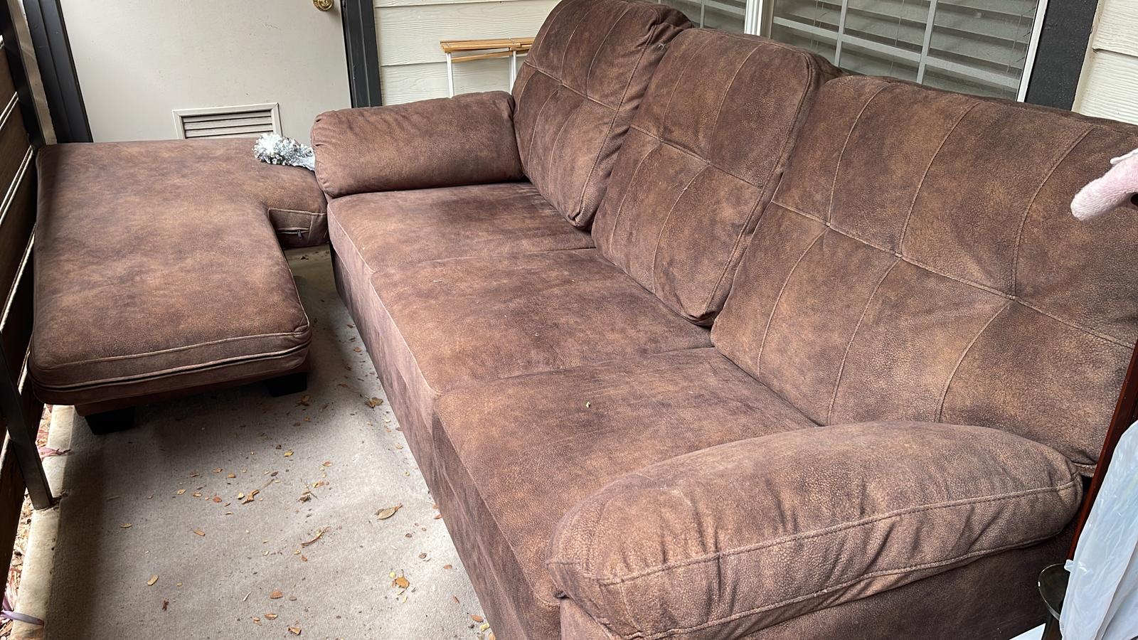 Before — brown sectional sofa worn and stained